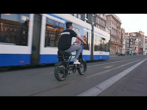 Riding through Amsterdam with the KNAAP Bike!